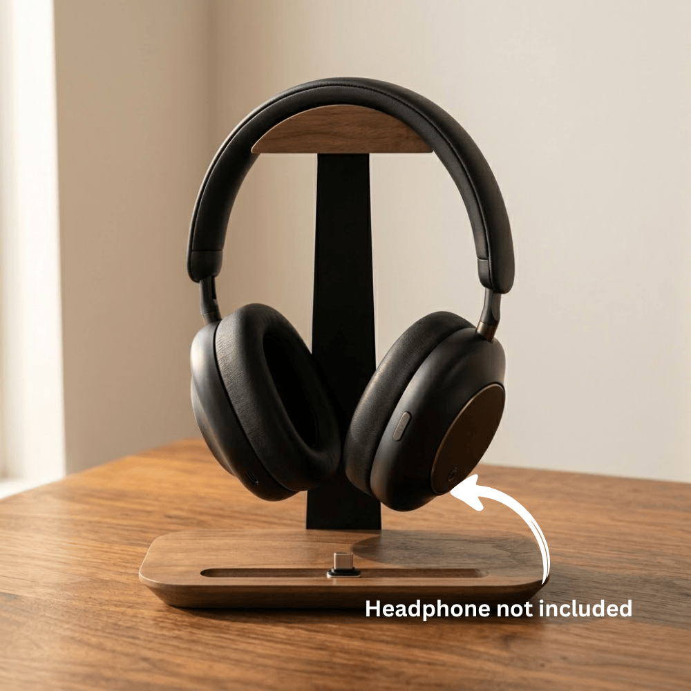 Clean product photo of a minimalist headphone stand with pen holder on a wooden desk.