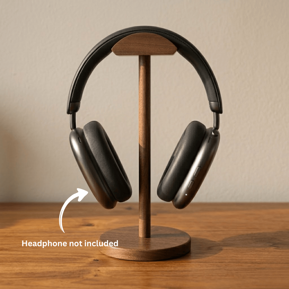 Clean product photo of a wooden headphone stand supporting wired headphones