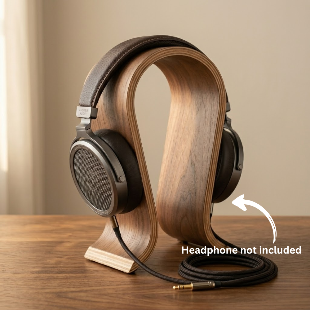 Wood headphone stand displayed on a desk without headphones