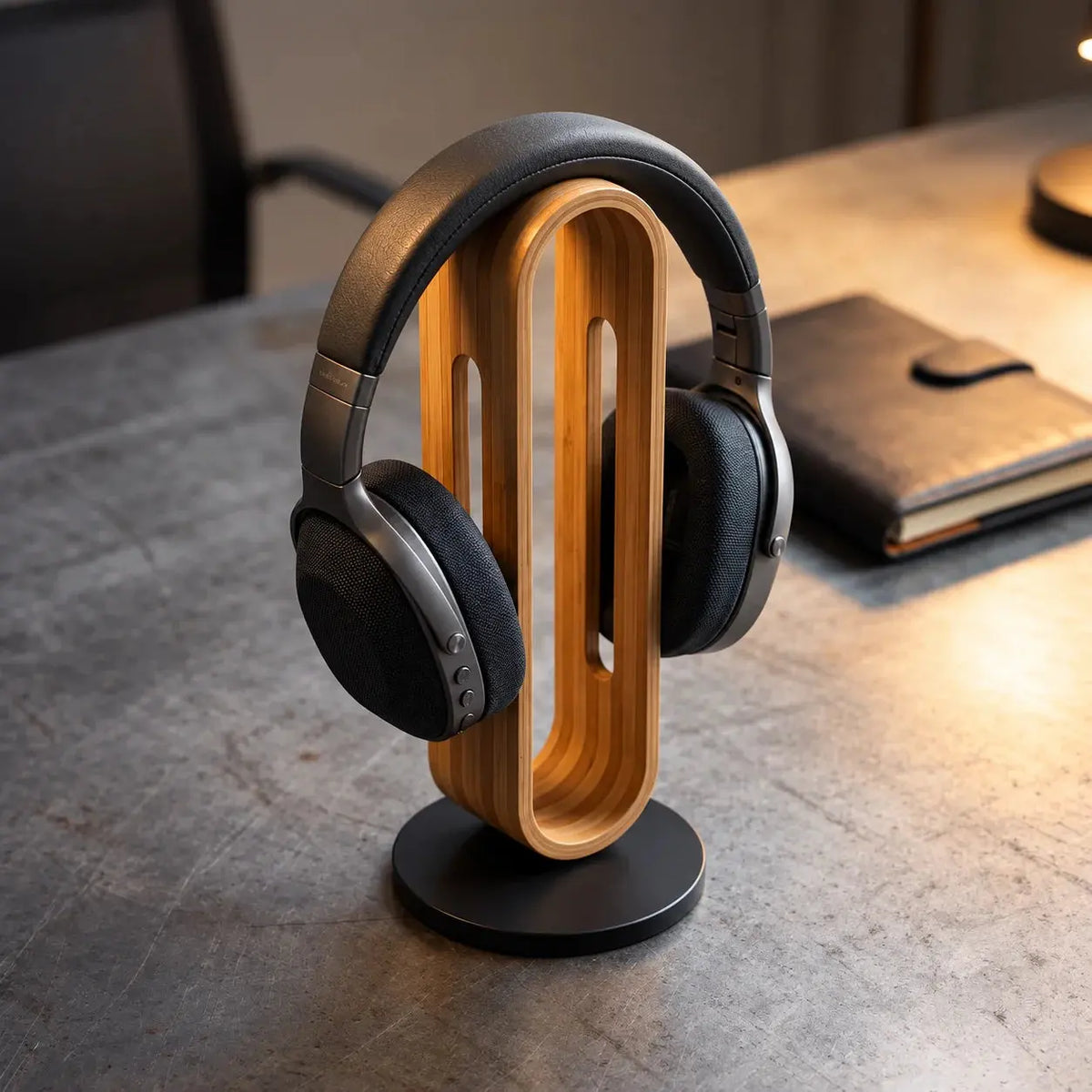 Bamboo wood headphone stand for desk with over-ear headphones