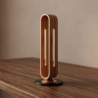 empty wooden headphone stand on dark wood desk surface