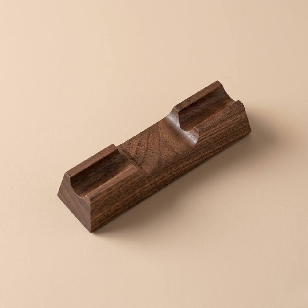 Single-slot walnut desk pen rest product photo on a wooden desk
