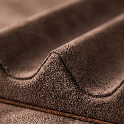 Close-up detail showing the soft leather lining of a desk pen tray