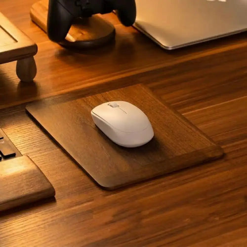 Solid Walnut Mouse Pad With White Mouse On Wooden Desk