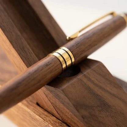 Close-up detail showing the wood grain of a walnut desk pen holder