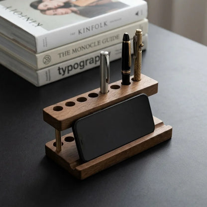 Walnut Phone & Pen Stand Organizer, a wooden phone stand for desk with a smartphone and pens