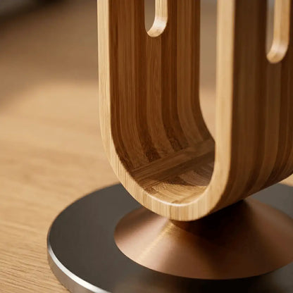 close-up of curved wood grain on headphone stand